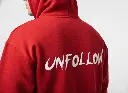 Unfollow - Embossed Puff Back Hoodie Red on model